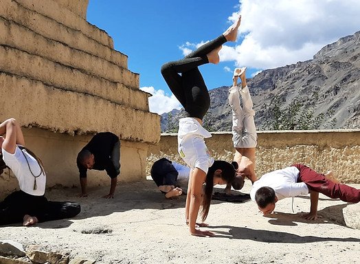 students of the 5-Month Anubhava Yoga TTC performing various authentic yoga poses in Spiti valley