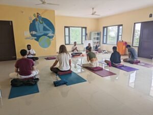 greetings students at the end of the initiation ceremony in the ashram in himachal pradesh