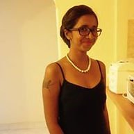 one of the most brilliant students, and a great potential for Yoga Teacher, Pragna, smiling for the camera