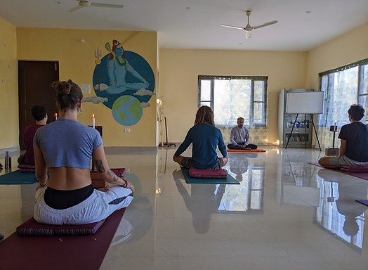 the powerful Kriya of Trataka being practiced during the yoga training in India